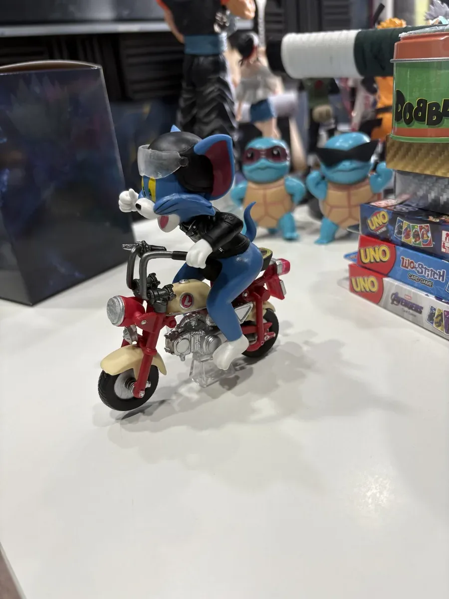 Tom Scooter Ride Figure